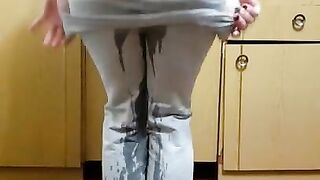 Massive Pee Stream all over Floor and Feet