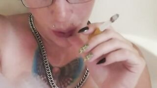 Tatted Blue Eyed Chick Smoking and Making Cute Face in the Bathtub