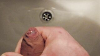 My quick cumshot during a risky masturbation in a public restroom