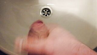 My quick cumshot during a risky masturbation in a public restroom