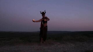 Candels Dance against the background of the night sky