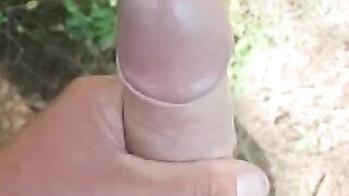 close up big dick wanking in the woods