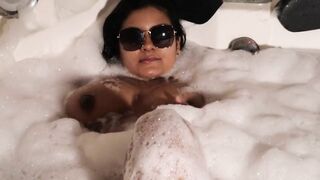 Busty Latina mischief in the hot tub