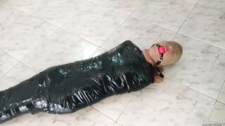 Tape Mummified Girl Pantyhose Hooded And Ball Gagged