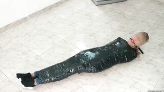 Tape Mummified Girl Pantyhose Hooded And Ball Gagged