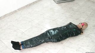 Tape Mummified Girl Pantyhose Hooded And Ball Gagged