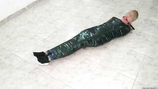 Tape Mummified Girl Pantyhose Hooded And Ball Gagged