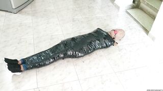 Tape Mummified Girl Pantyhose Hooded And Ball Gagged