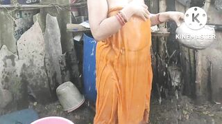 Anita yadav bathing outside with hot