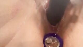 Pussy grips dildo with anal plug in