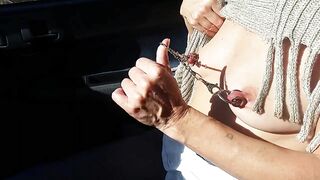 nippleringlover flashing pierced tits with stretched nipple piercings while driving to the beach