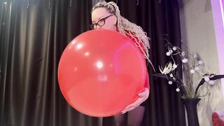 Looner girl in glasses and red PVC dress blow BIG red balloon and pop it with ass. DM to get full