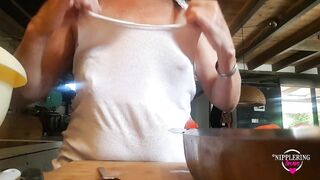 nippleringlover flashing pierced nipples with big heavy nipple ring stretching nipple while cooking