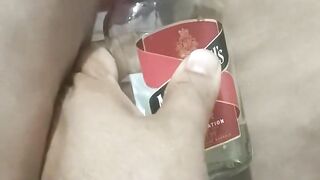 Bhabi pissing in rum bottle