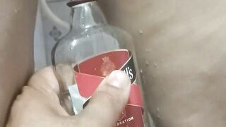 Bhabi pissing in rum bottle