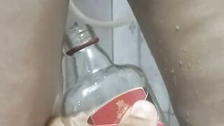 Bhabi pissing in rum bottle