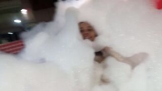 I record my new girlfriend in the tub full of foam, all sexy and naughty, dancing sexy in the motel