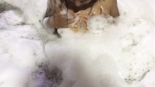 A bubble bath and a penis to end the day in style