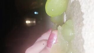 Smashing juicy grapes under my big toes close up under and side pov