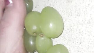 Smashing juicy grapes under my big toes close up under and side pov