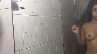 horny latina makes a video while bathing